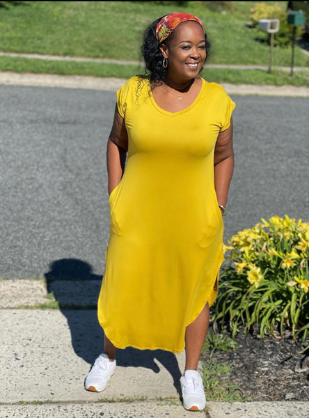 Short Sleeve Midi Dress · Side Splits · Jersey Material · Mustard Color  Available in 1x, 2x, 3x  Model wearing 1x